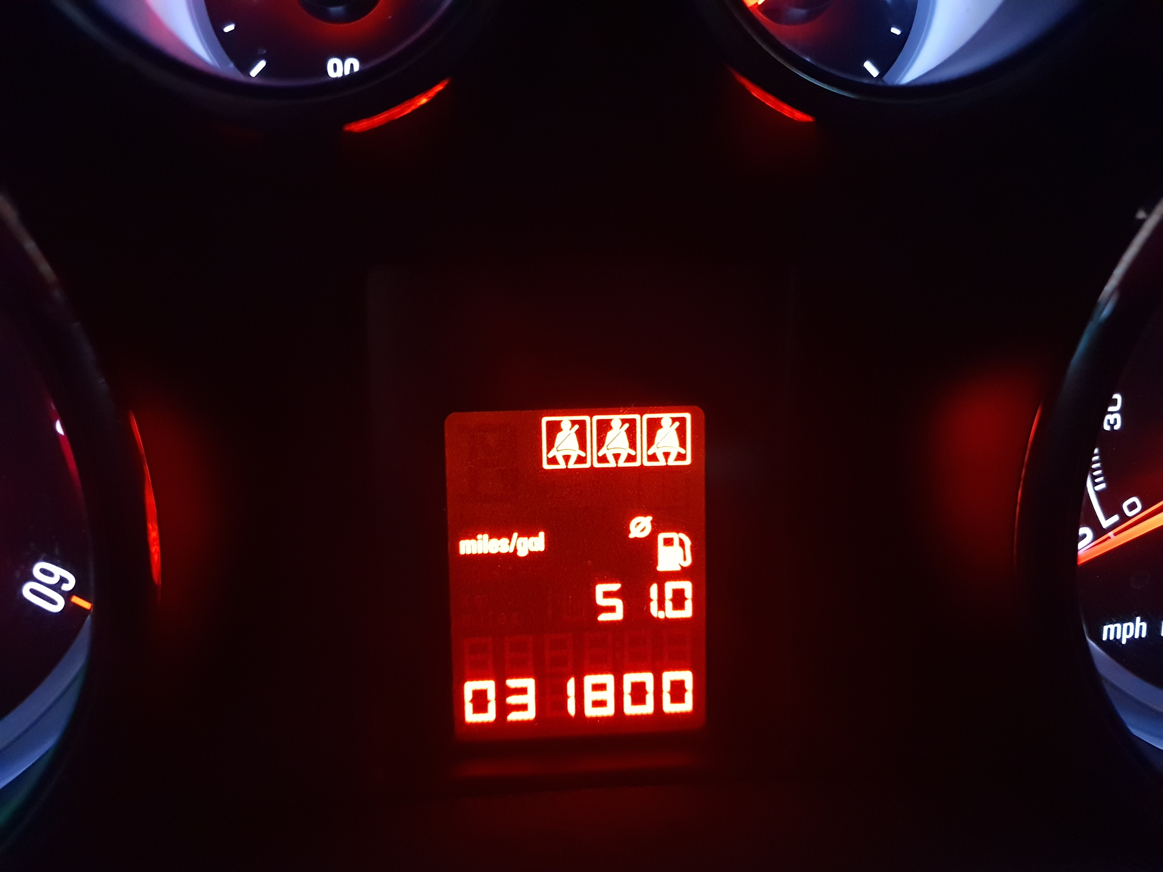 Car dashboard display showing miles/gal 51.0